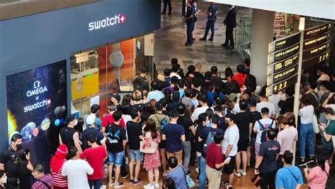 omega x swatch queue